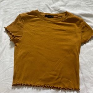 Burnt Orange ruffled crop top from Forever 21
